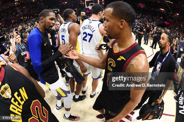 Kevin Durant of the Golden State Warriors and Rodney Hood of the Cleveland Cavaliers hug after Game Four of the 2018 NBA Finals on June 8, 2018 at...