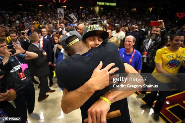 Kevin Durant and Stephen Curry of the Golden State Warriors celebrate after defeating the Cleveland Cavaliers during Game Four of the 2018 NBA Finals...