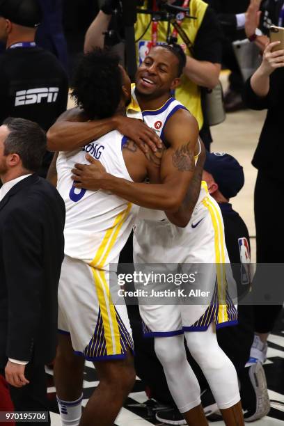 Nick Young and Andre Iguodala of the Golden State Warriors of the Golden State Warriors celebrates after defeating the Cleveland Cavaliers during...