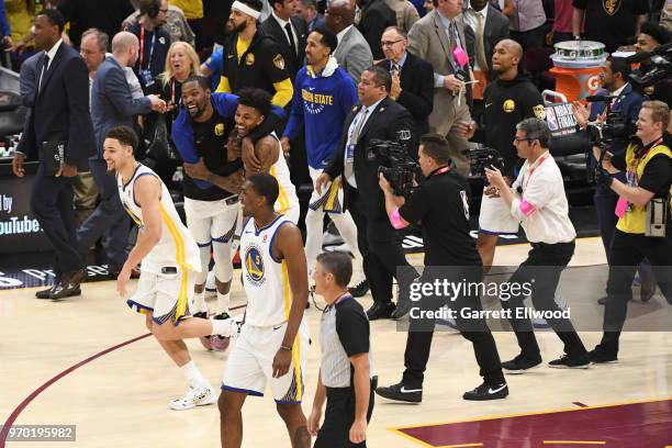 Kevin Durant of the Golden State Warriors celebrates with Nicky Young after defeating the Cleveland Cavaliers and winning the NBA Championship during...