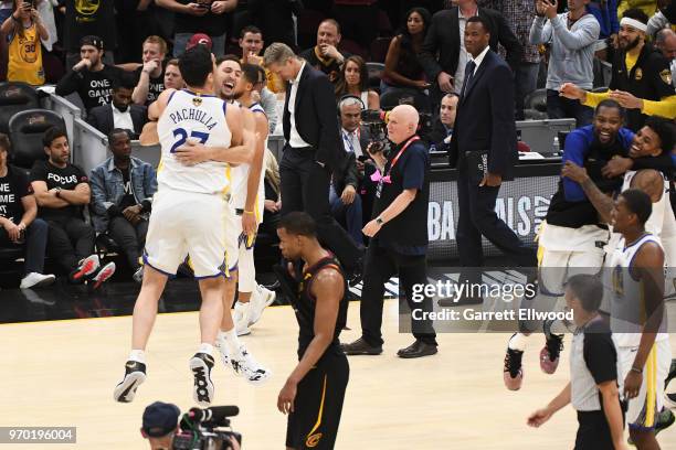 Klay Thompson of the Golden State Warriors celebrates with Zaza Pachulia after defeating the Cleveland Cavaliers and winning the NBA Championship...