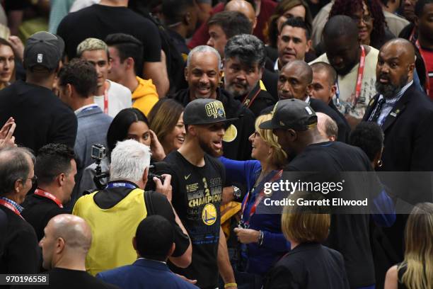 Stephen Curry of the Golden State Warriors celebrates with Kevin Durant after defeating the Cleveland Cavaliers and winning the NBA Championship...