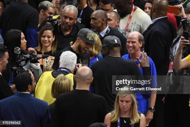 Stephen Curry of the Golden State Warriors celebrates with Kevin Durant after defeating the Cleveland Cavaliers and winning the NBA Championship...