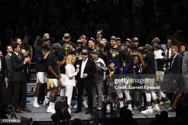 Joe Jacob of the Golden State Warriors talks with Doris Burke after defeating the Cleveland Cavaliers and winning the NBA Championship during Game...