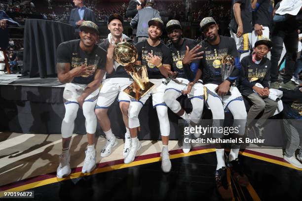 Andre Iguodala, Klay Thompson, Stephen Curry, Draymond Green, and Kevin Durant of the Golden State Warriors pose with the Larry O'Brien Championship...