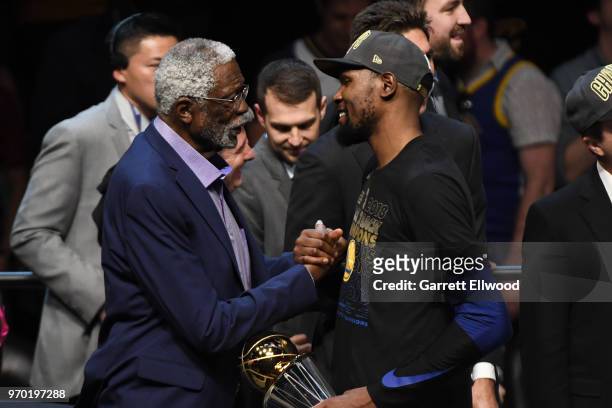 Bill Russell presents Kevin Durant of the Golden State Warriors with the Bill Russell NBA Finals Most Valuable Player Award after defeating the...