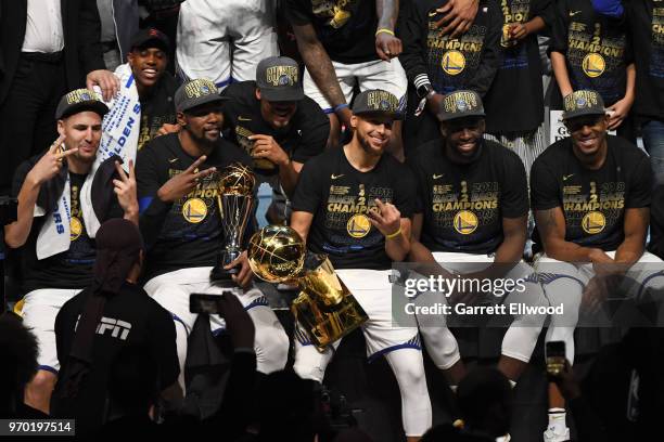 Klay Thompson, Kevin Durant, Stephen Curry, Draymond Green and Andre Iguodala pose for a photo after defeating the Cleveland Cavaliers during Game...