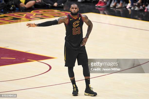 LeBron James of the Cleveland Cavaliers reacts against the Golden State Warriors during Game Four of the 2018 NBA Finals at Quicken Loans Arena on...