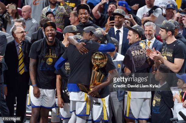 The Golden State Warriors celebrate after the game against the Cleveland Cavaliers as they hold the Larry O'Brien NBA Championship Trophy after Game...
