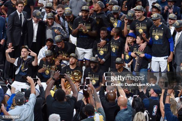 The Golden State Warriors celebrate a four game sweep after the game against the Cleveland Cavaliers as they hold the Larry O'Brien NBA Championship...