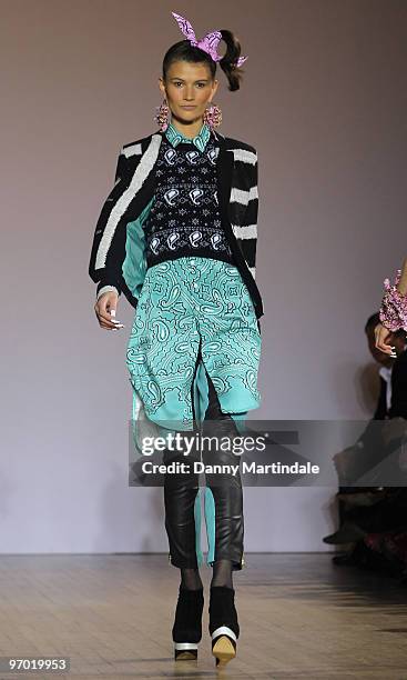 Model walks the runway at the House Of Holland show for London Fashion Week Autumn/Winter 2010 at Bloomsbury Ballroom on February 20, 2010 in London,...