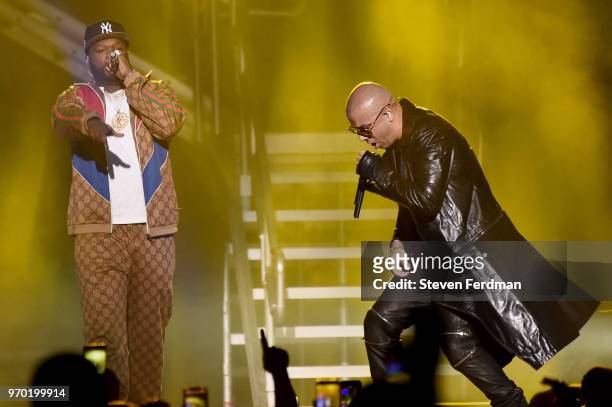Cent and Wisin perform live on stage at Madison Square Garden during Wisin y Yandel in Concert on June 8, 2018 in New York City.