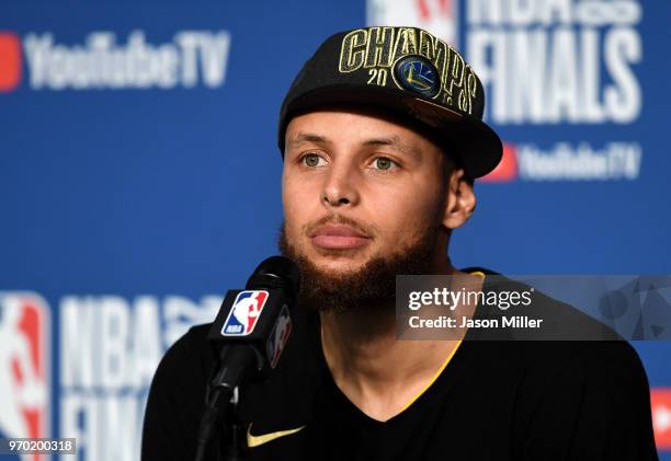 Stephen Curry of the Golden State Warriors speaks to the media after defeating the Cleveland Cavaliers during Game Four of the 2018 NBA Finals at...