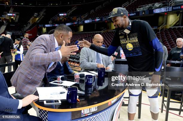 Kevin Durant of the Golden State Warriors talks with Casey Stern, Grant Hill, Chris Weber, and Charles Barkley after Game Four of the 2018 NBA Finals...