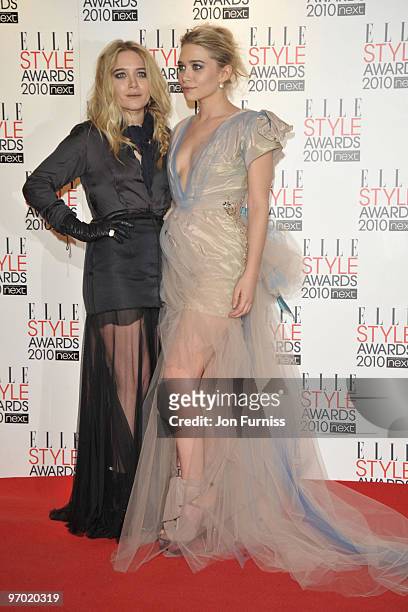 Mary-Kate Olsen and Ashley Olsen pose in the winners room at the ELLE Style Awards at Grand Connaught Rooms on February 22, 2010 in London, England.