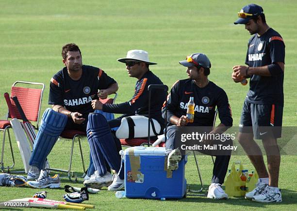 Sachin Tendulkar has a word with Virender Sehwag during the practice session in Gwalior on February 23, 2010.