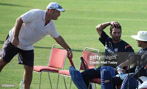 Sachin Tendulkar takes a break during the practice session in Gwalior on February 23, 2010.