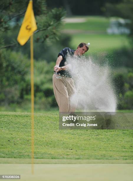 Phil Mickelson of the United States chips out of the sand bunker onto the 5th green during the Buick Invitational golf tournament on 7 February 1997...
