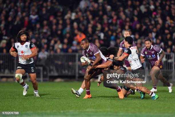 Akuila Uate of the Sea Eagles charges forward during the round 14 NRL match between the Manly Sea Eagles and the New Zealand Warriors at AMI Stadium...