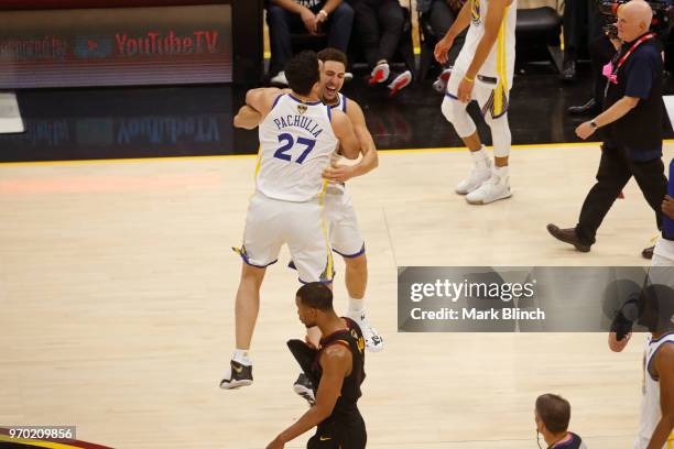 Zaza Pachulia and Klay Thompson of the Golden State Warriors celebrate on court after winning Game Four of the 2018 NBA Finals against the Cleveland...