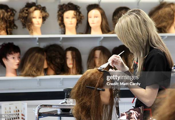 Older pupil at the Bridge Learning Campus learns hairdressing on February 24, 2010 in Bristol, England. The 40million GBP campus in Hartcliffe,...