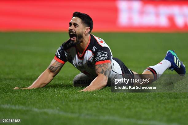 Shaun Johnson of the Warriors celebrtates scoring a try during the round 14 NRL match between the Manly Sea Eagles and the New Zealand Warriors at...