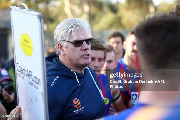 Port Melbourne Senior Coach Gary Ayres talks to his players during the round 10 VFL match between Werribee and Port Melbourne at Avalon Airport Oval...