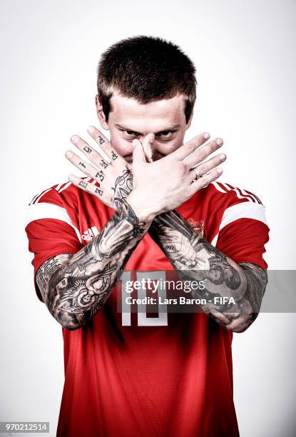 Fedor Smolov of Russia poses for a portrait during the official FIFA World Cup 2018 portrait session at Federal Sports Centre Novogorsk on June 8,...