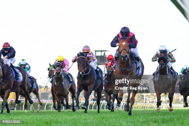 Barthelona ridden by Lachlan King wins the TAB/ATA Celebrates Women Trainers Handicap at Flemington Racecourse on June 09, 2018 in Flemington,...