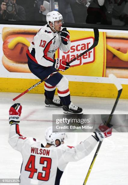 Jakub Vrana and Tom Wilson of the Washington Capitals celebrate after Wilson assisted Vrana on a second-period goal against the Vegas Golden Knights...