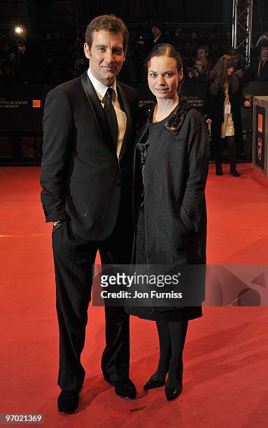 Actor Clive Owen and Sarah-Jane Fenton attend the Orange British Academy Film Awards 2010 at the Royal Opera House on February 21, 2010 in London,...