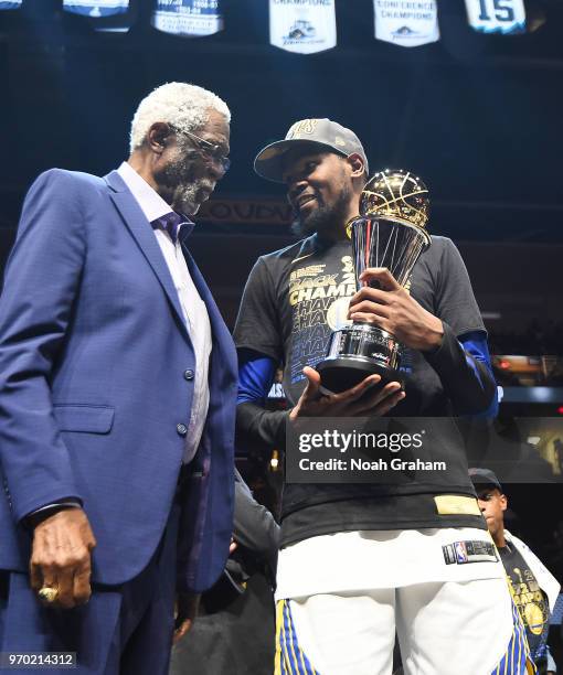 Kevin Durant of the Golden State Warriors stands next to Former NBA Player Bill Russell after receiving the Bill Russell NBA Finals Most Valuable...