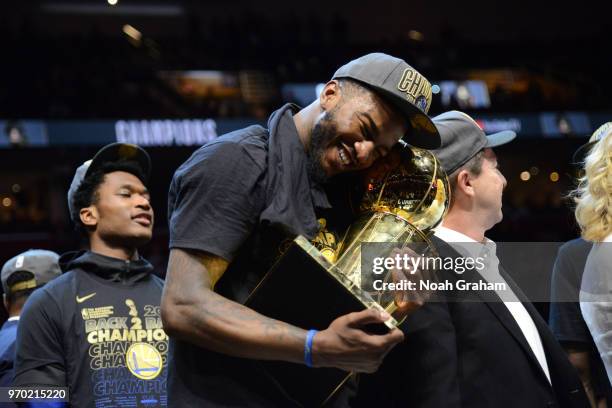 Jordan Bell of the Golden State Warriors holds Larry O'Brien Championship Trophy after the game against the Cleveland Cavaliers during Game Four of...