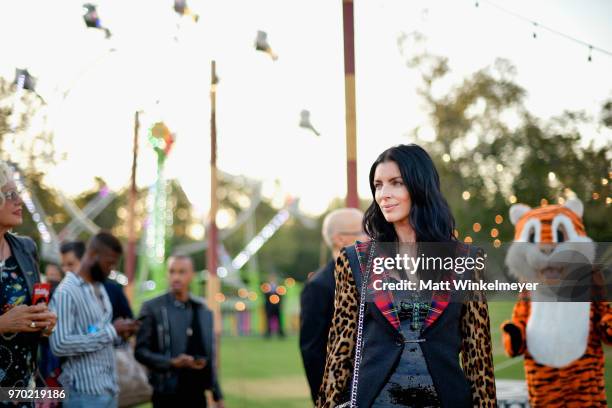 Liberty Ross attends the Moschino Spring/Summer 19 Menswear and Women's Resort Collection at Los Angeles Equestrian Center on June 8, 2018 in...