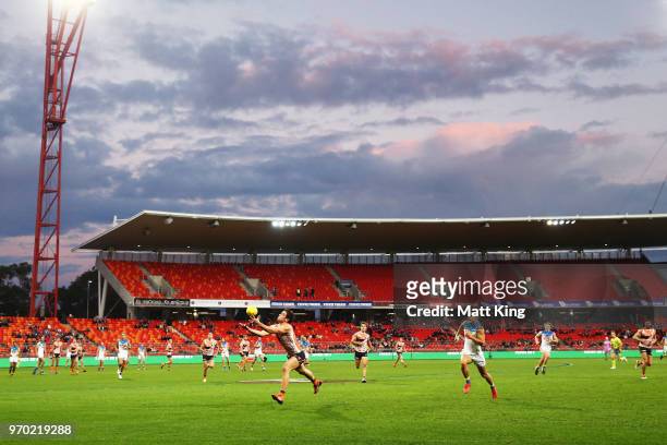 Tim Taranto of the Giants takes a mark during the round 12 AFL match between the Greater Western Sydney Giants and the Gold Coast Suns at Spotless...