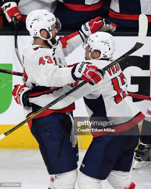 Tom Wilson and Jakub Vrana of the Washington Capitals celebrate after Wilson assisted Vrana on a second-period goal against the Vegas Golden Knights...