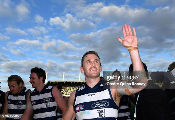 Joel Selwood of the Cats high fives fans after winning the round 12 AFL match between the Geelong Cats and the North Melbourne Kangaroos at GMHBA...