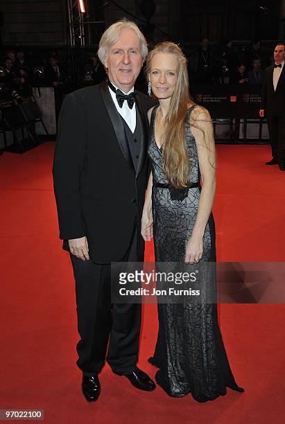 Director James Cameron and Suzy Amis attends the Orange British Academy Film Awards 2010 at the Royal Opera House on February 21, 2010 in London,...