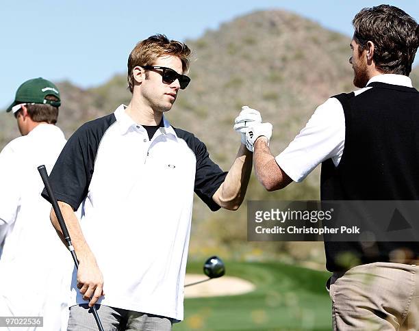 Actors Dave Annable and Shaun Sipos golf at Oakley's "Learn To Ride" Golf at Silverleaf on February 23, 2010 in Scottsdale, Arizona.