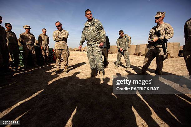 Marine Brigadier General Larry Nicholson and General David M. Rodriguez deputy commander of US Forces Afghanistan address marines in Trikh Nawar on...