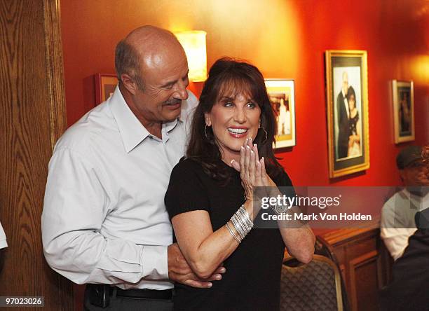 Dr. Phil McGraw and Robin McGraw enjoy theire time at Syliva's Soulfood restaurantlocated at 328 Lenox Ave during the taping of the Launch of the 8th...