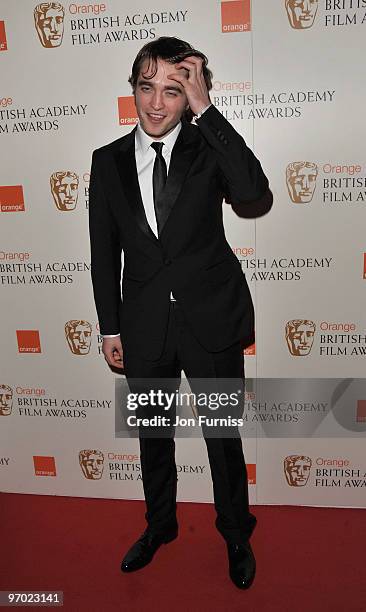 Actor Robert Pattinson attends the Orange British Academy Film Awards 2010 at the Royal Opera House on February 21, 2010 in London, England.