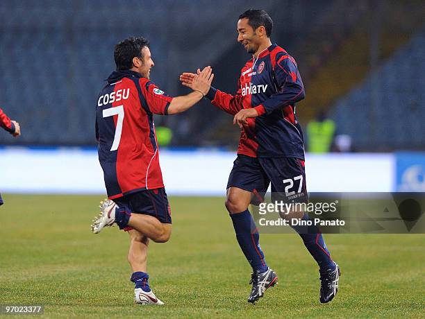 Jeda of Cagliari celebrates with teammate Andrea Cossu after scoring the 1:0 goal during the Serie A match between Udinese Calcio and Cagliari Calcio...