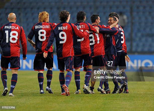 Jeda of Cagliari celebrates with Alessandro Agostini and teammates after scoring the opening goal of the Serie A match between Udinese Calcio and...