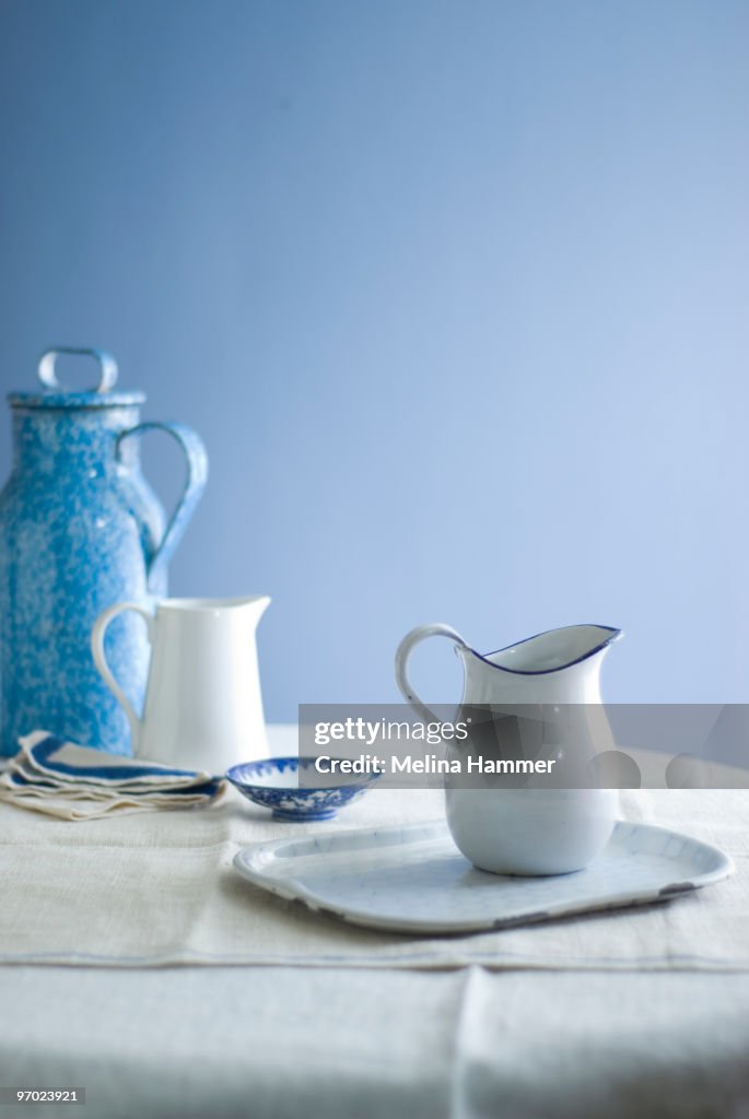 Blue still life with pitchers