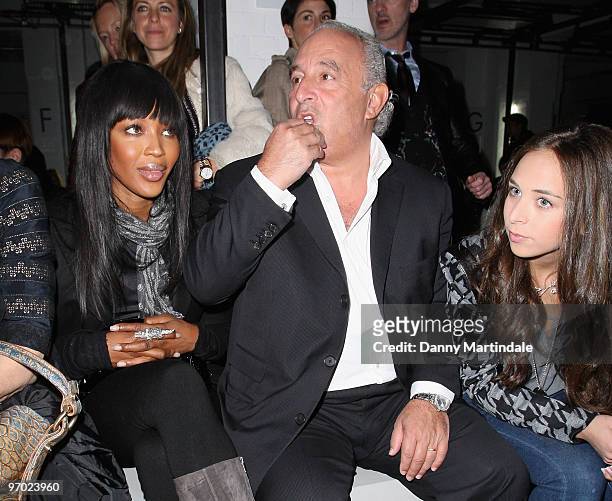 Naomi Campbell, Philip Green and Chloe Green pose on the front row at the Christopher Kane show for London Fashion Week Autumn/Winter 2010 at TopShop...