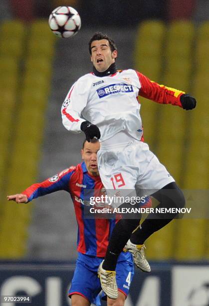 Alvaro Negredo of Sevilla fights for the ball with Sergei Ignashevich of CSKA in Moscow on February 24, 2010 during their last 16 round UEFA...