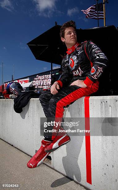 Marco Andretti, driver of the Venom Energy Drink Andretti Autosport Honda Dallara, sits on the pit wall during the IRL Indy Car Series Spring Testing...