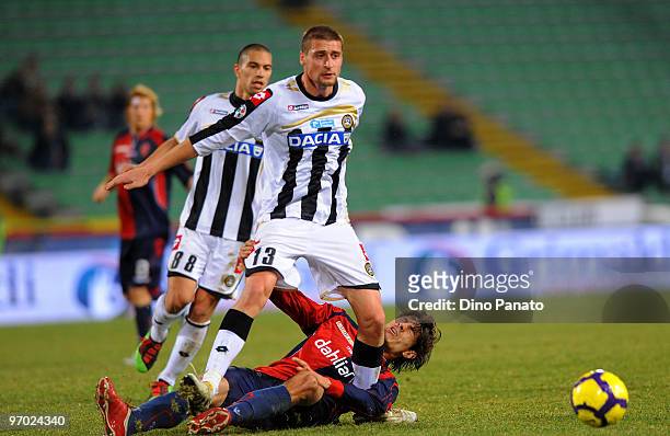 Andrea Coda of Udinese competes with Anderson Miguel Da Silva Nene' of Cagliari during the Serie A match between Udinese Calcio and Cagliari Calcio...
