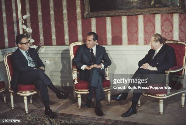 American Republican politician and 37th President of the United States, Richard Nixon pictured in centre with, on left, National Security Advisor...